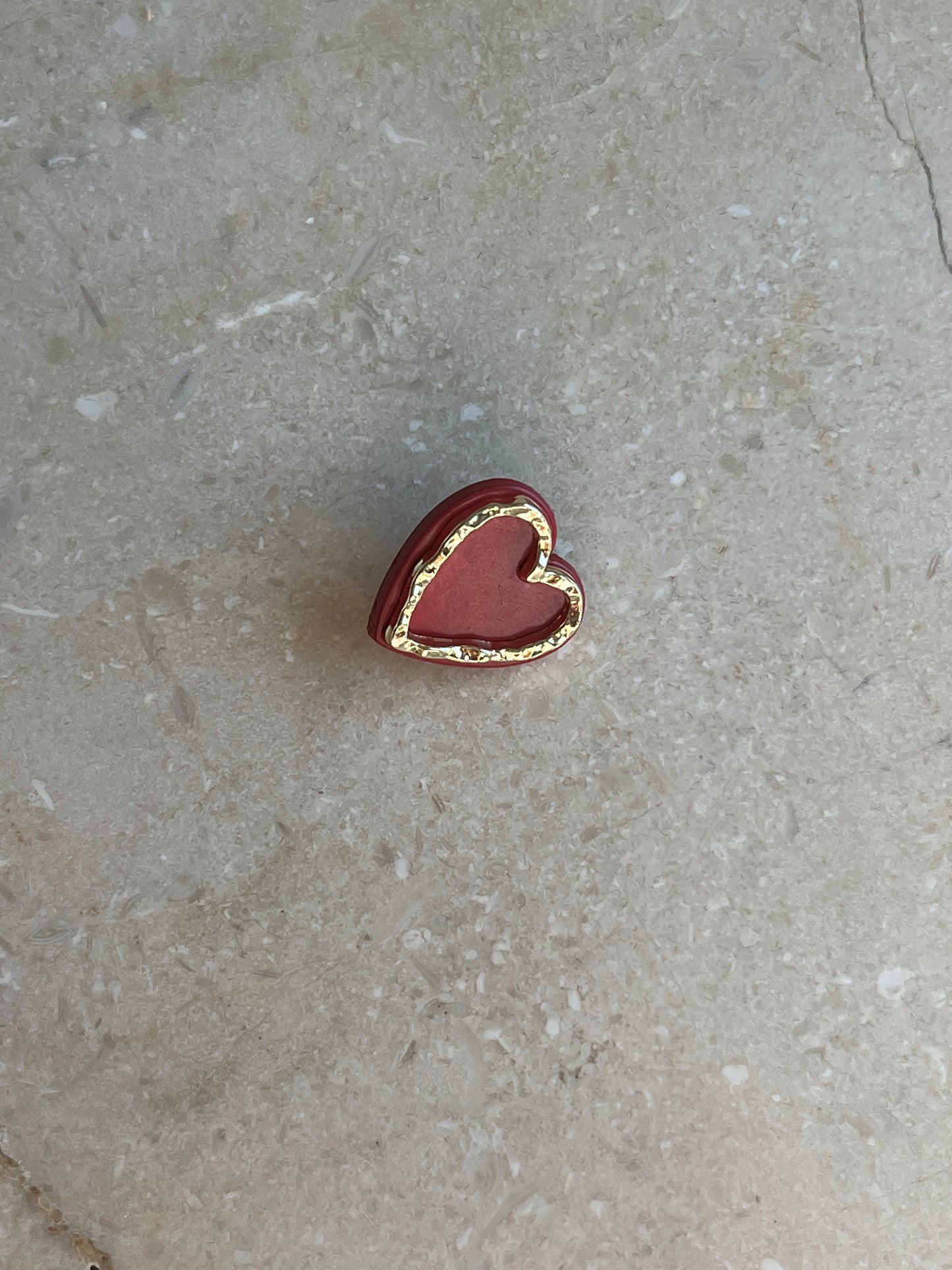 Red heart button