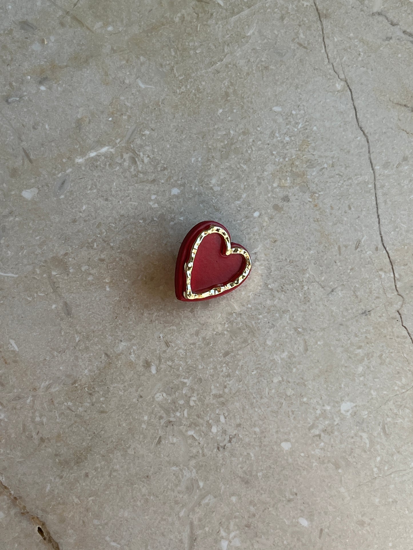 Red heart button