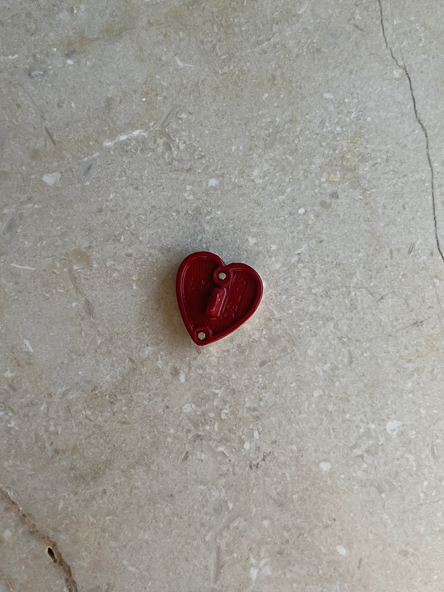Red heart button