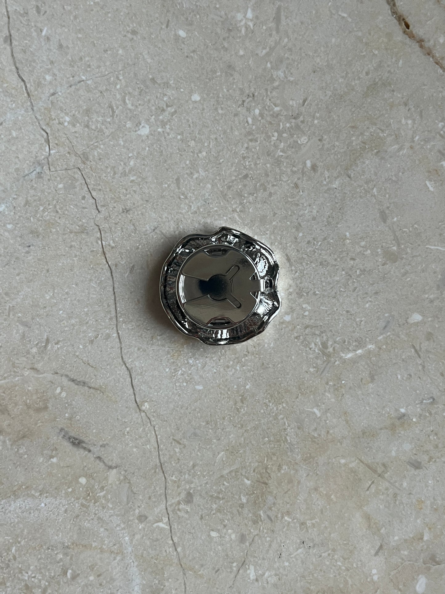 Iris button cover