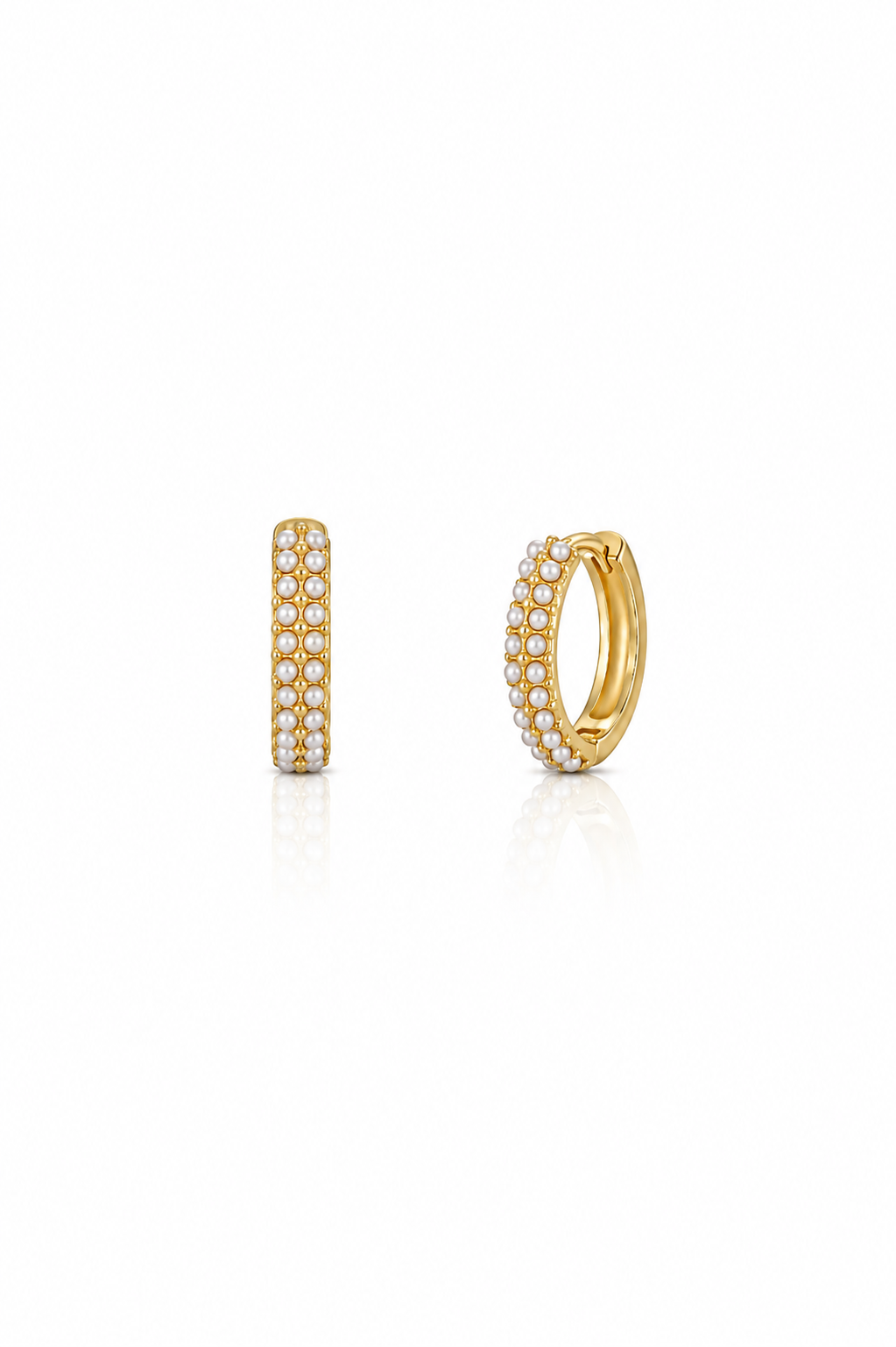 Pearl Huggie Hoops in gold