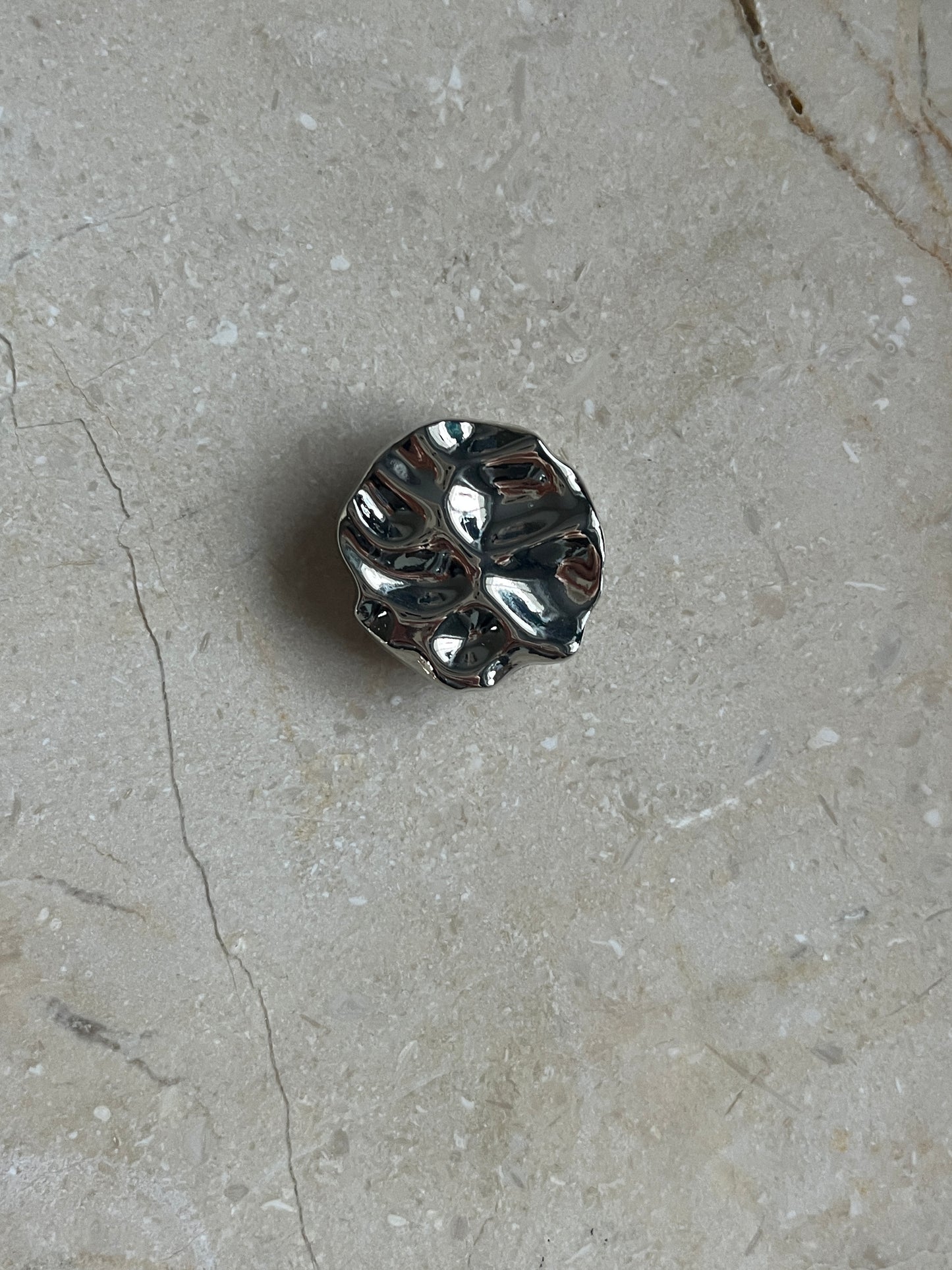 Iris button cover